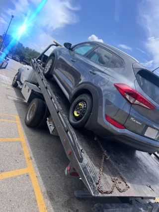 Coyotillo Towing Roadside assistance Jump start and Tow Truck Near Me Denver - photo 1