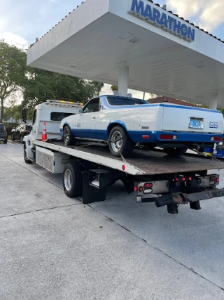 Tropical Towing | Roadside Assistance • Jump Start • Fuel Delivery | - photo 1