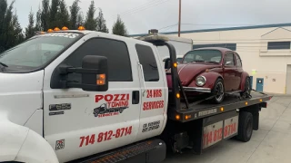 Pozzi Towing Inc