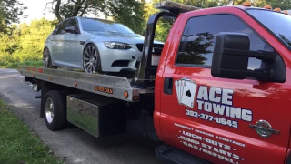 ACE TOWING & WE PAY CASH FOR CARS