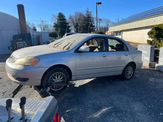 THE JUNK CAR KING ELIZABETH