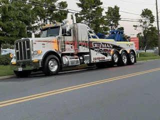 Guzman Towing Inc
