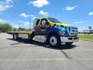 K O Towing Inc