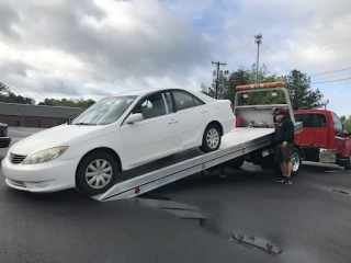 ACME Towing & Wrecker Services Tow Truck. Office hours 8-5 Mon.-Fri.