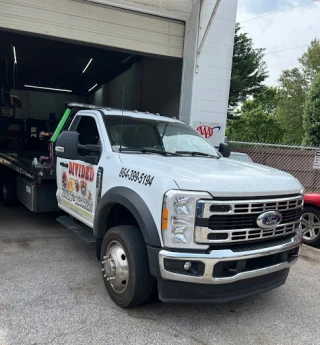 Country Life Tires Batteries & Service and Divided Towing