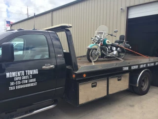 Momento Towing llc