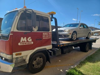 Mg. towing- wrecker service