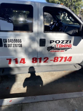 Pozzi Towing Inc