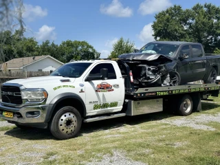 NOLA TOWING TRUCKS LLC