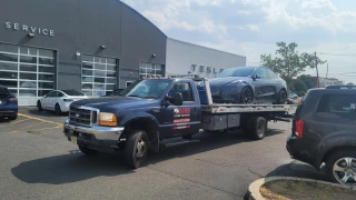 TUMI TOWING LLC