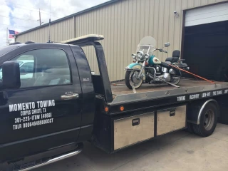 Momento Towing llc
