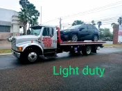 L - J's or garza's Wrecker Service