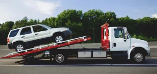 ToWiNg Specialist INC.