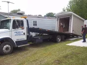 Low Dollar Companies L.L.C. / Towing Road Service