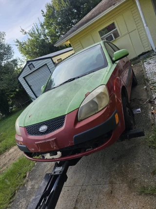 Wayne Buys Junk Cars