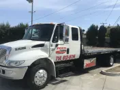 Pozzi Towing Inc