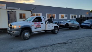 Milan Towing/Compania de Gruas, Lynn MA